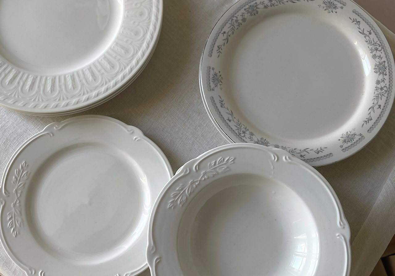 Photograph of a table set with linen textiles