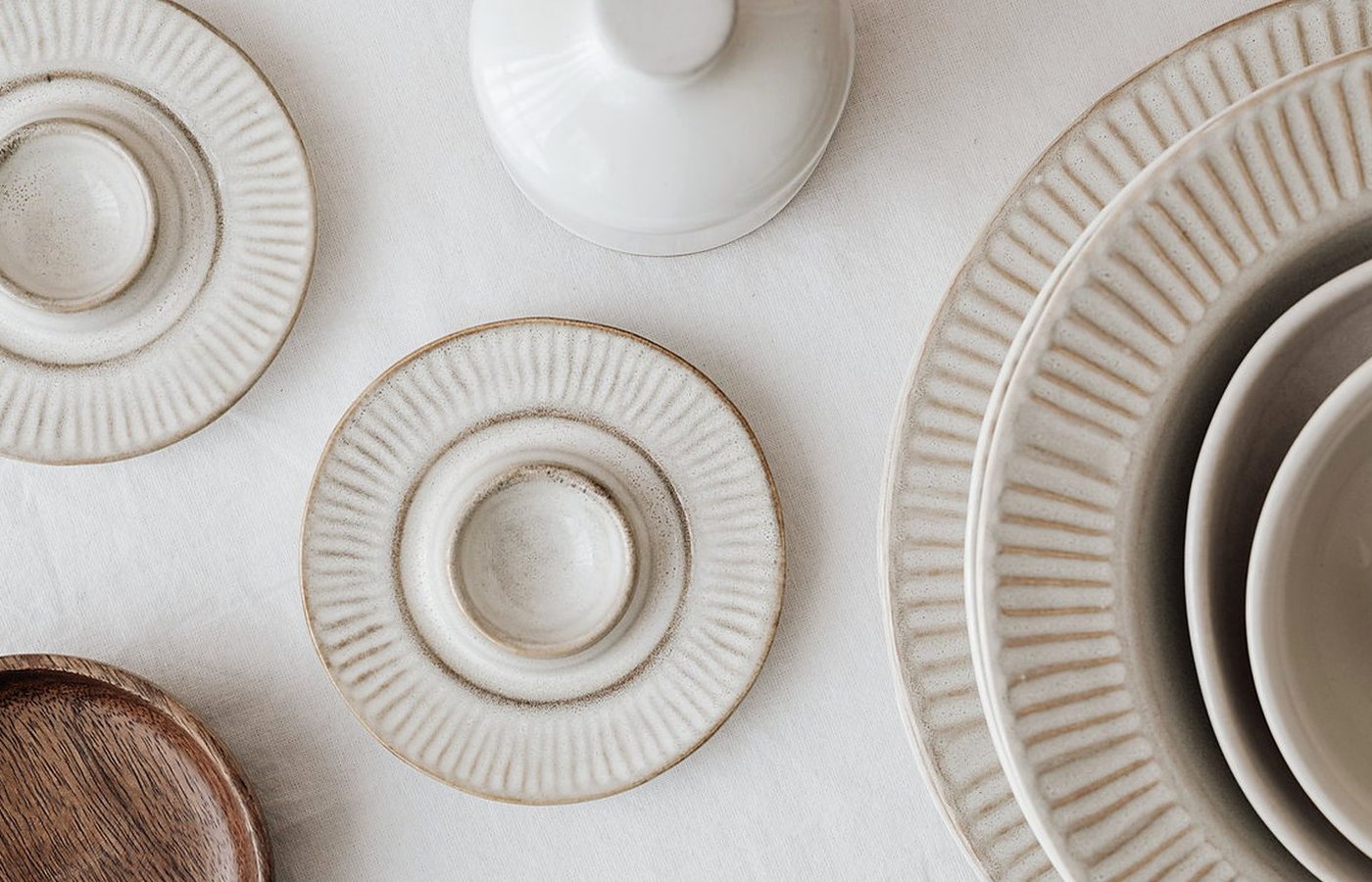 Real photograph illustrating cutlery, crockery, glassware and professional table presentation — detail
